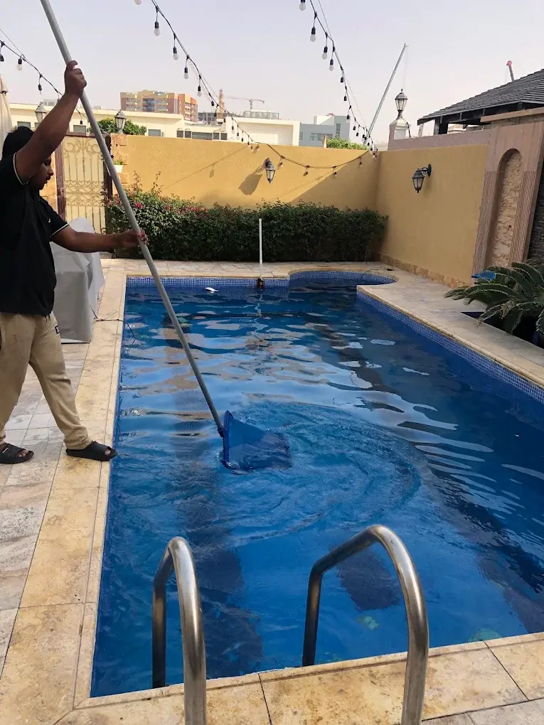 Crystal clear villa pool after weekly maintenance in Al Barsha